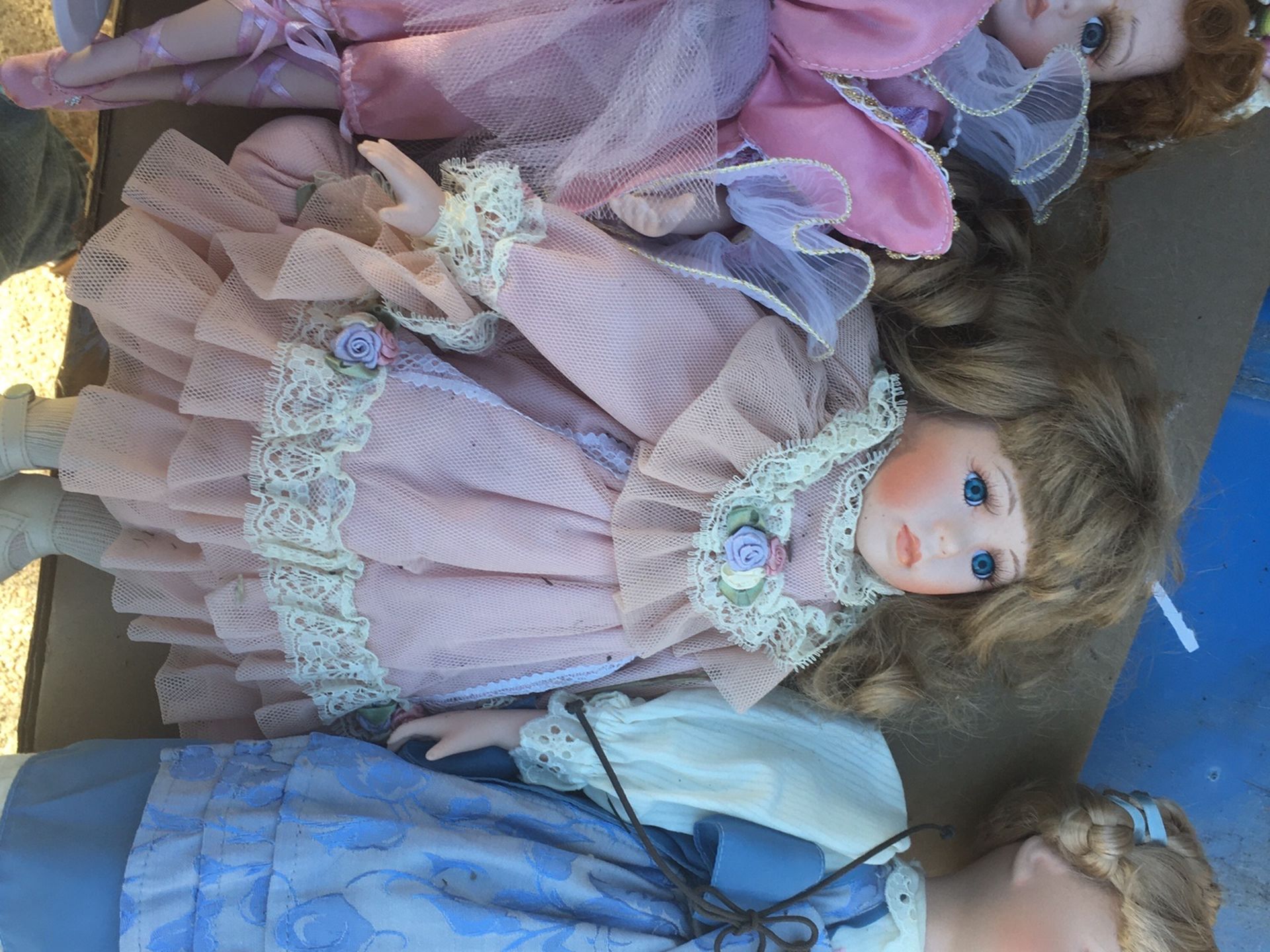 Set of vintage ceramic dolls with stands are for $50