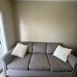 Gray Couch & Black Ottoman