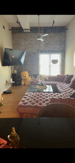 Pink tufted couch