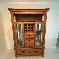 ul solid wood  cabinet featuring glass display doors, built-in wine bottle 