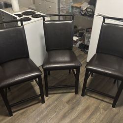 Three Solid Wood Dark Brown Chairs