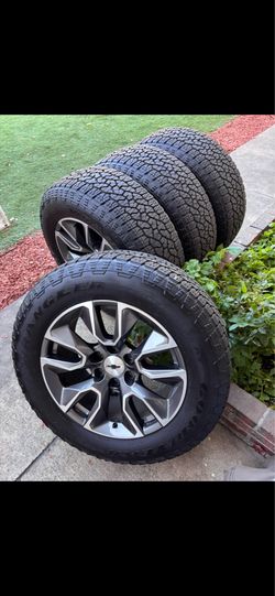 Chevy Silverado stock rims and tires