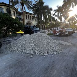 Small bobcat excavator limerock gravel clean dirt fill sand pavers concrete pools backfill 