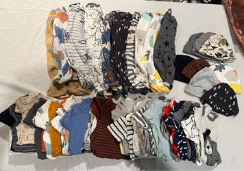 Newborn boys Carters and Gerber onesies, pajamas and hats