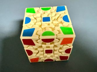 The 3x3x3 Multicolor Cube Twist Puzzle is a fun and challenging brain teaser designed for ages 17 and up. Made from durable plastic, this puzzle featu