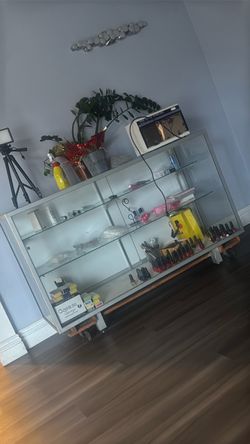 Display case good condition on a dolly comes with it