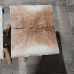 2 cowhide folding stools 