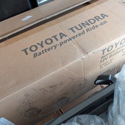 Toyota Tundra 12V 7Ah Kids Electric Ride on Car Battery Powered Electric Truck Trunk with Remote Control Bluetooth 4 Wheel Full Suspension
