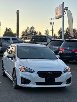 Subaru Impreza White Sedan