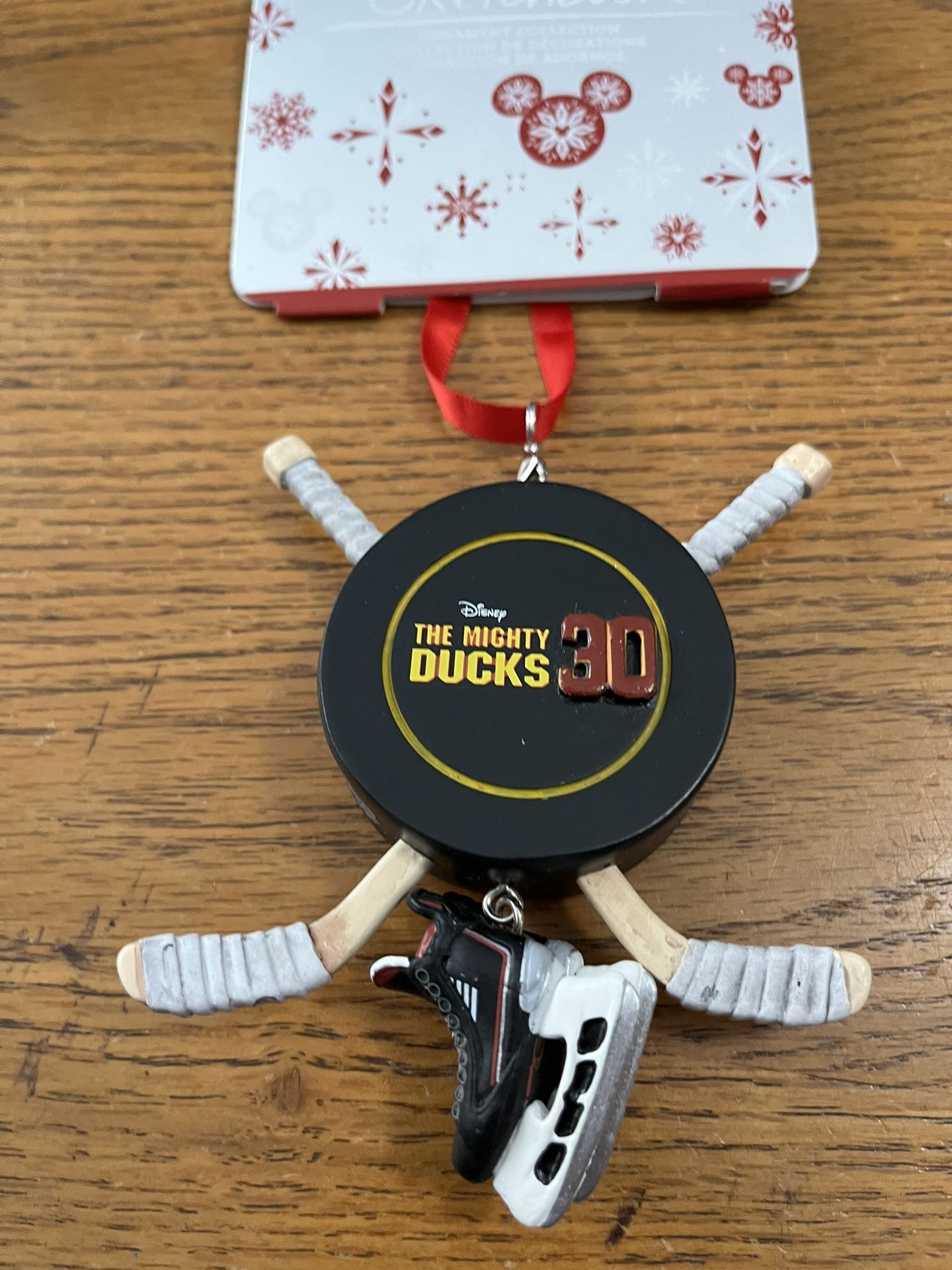 Disney Sketchbook The Mighty Ducks 30 Ornament. With hockey sticks and ice skating boots.  Very cute.  Brand new on original card.  