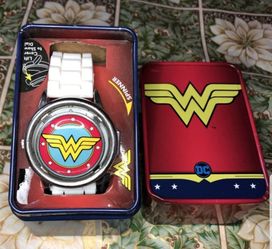 Wonder woman watch with tin can .