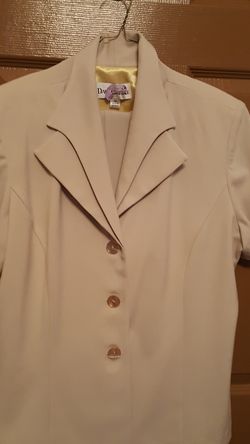 Several Suits Size 14.