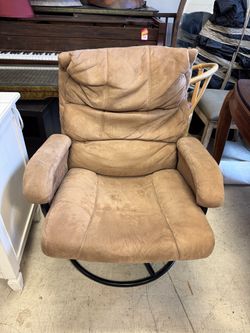 Tan Suede Swivel Lounge Chair