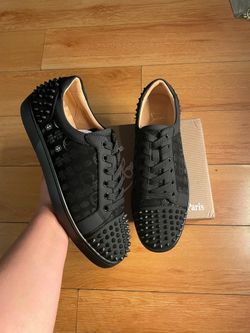Christian Louboutin with design