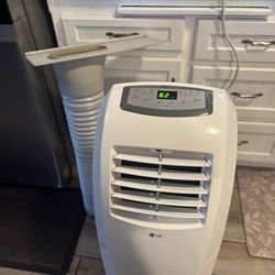 LG portable air conditioner with attachments