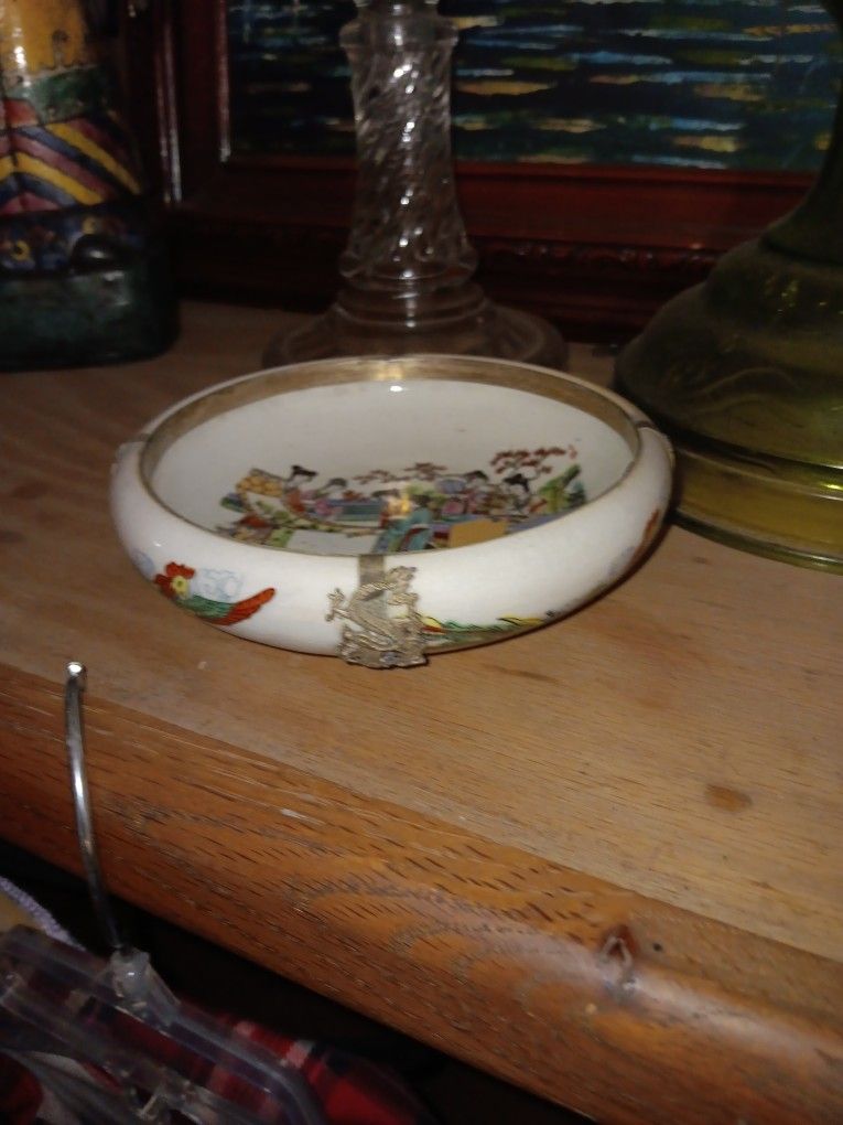 Silver lined rimmed and bossed or applied chinese bowl
