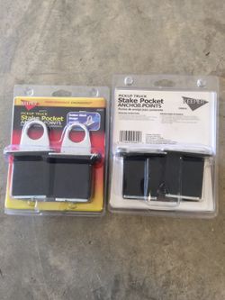 Truck stake pocket anchor points