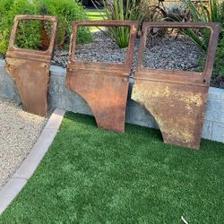 Three Old Rusted  Truck Doors 
