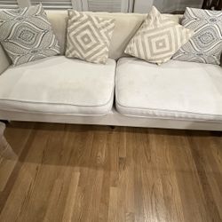 Beige Upholstered Tufted Sofa