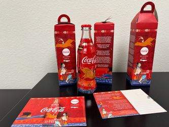 Unopened Coca Cola collectors bottles from Europe Greece 3 total new