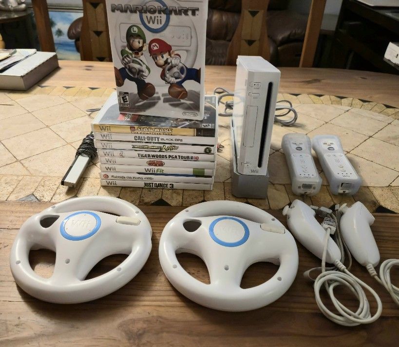 Wii Mario Kart Bundle. Console, Controllers, Nunchuck Controllers, Racing Wheels , 10 Games.