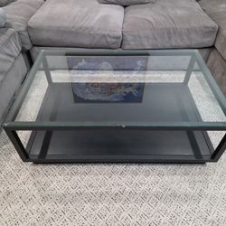 Modern Glass Top Coffee Table with Black Metal Frame and Lower Shelf