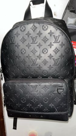 Louis Vuitton Discovery Monogram Backpack