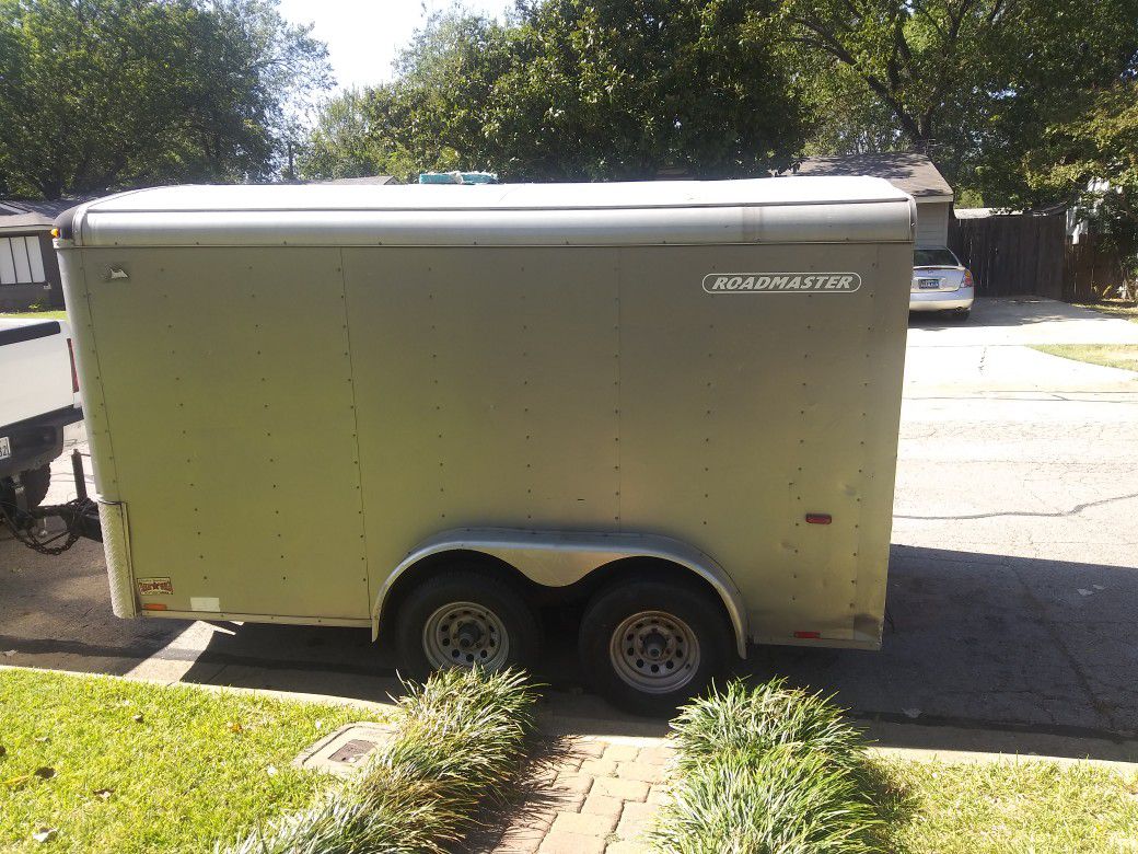7x14 foot trailer double axle will trade for chevy 1500 swb single or crew cab.