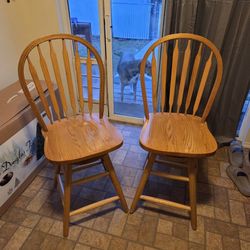 Set Of 2 Solid Oak Swivel Bar Stools