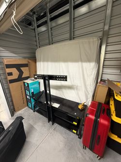 King mattress and tv stand