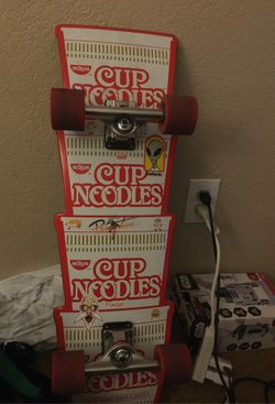 DGK Cup noodles limited edition long board. With independent trucks, ricers, 65mm wheels.