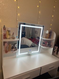 Vanity with lights and plug in