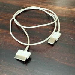 Apple 30-pin to USB-A charging and data sync cable.