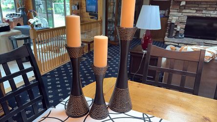 3 candles holders with candles