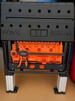 Horse saw with clamps