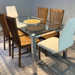 Glass Dining room Table With Two White Chairs