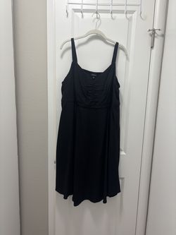 Barely worn Torrid mini black dress w/ pockets