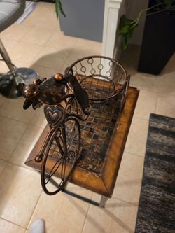 Brass dog with storage space
