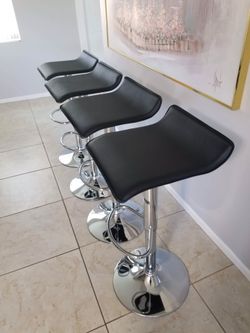 NEW Black Bar Stools. $65each. Modern Desing with Faux Leather. Adjustable Swivel Chair. Brand New Assembled