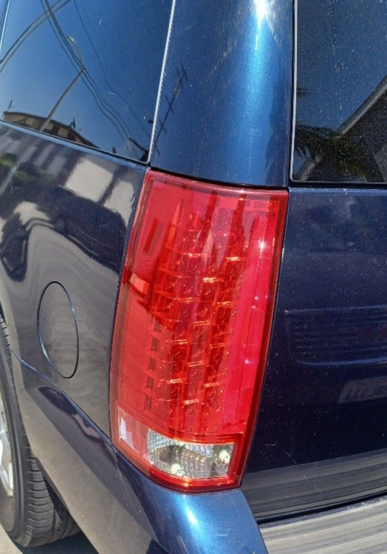 2007-2013 GMC YUKON YUKON XL YUKON DENALI RED / CLEAR LED TAIL LIGHTS. 2007-2013 CHEVROLET SUBURBAN / TAHOE. RED L.E.D. LED FOR BRAKE AND TURN SIGNAL.
