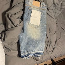 Purple jorts $200