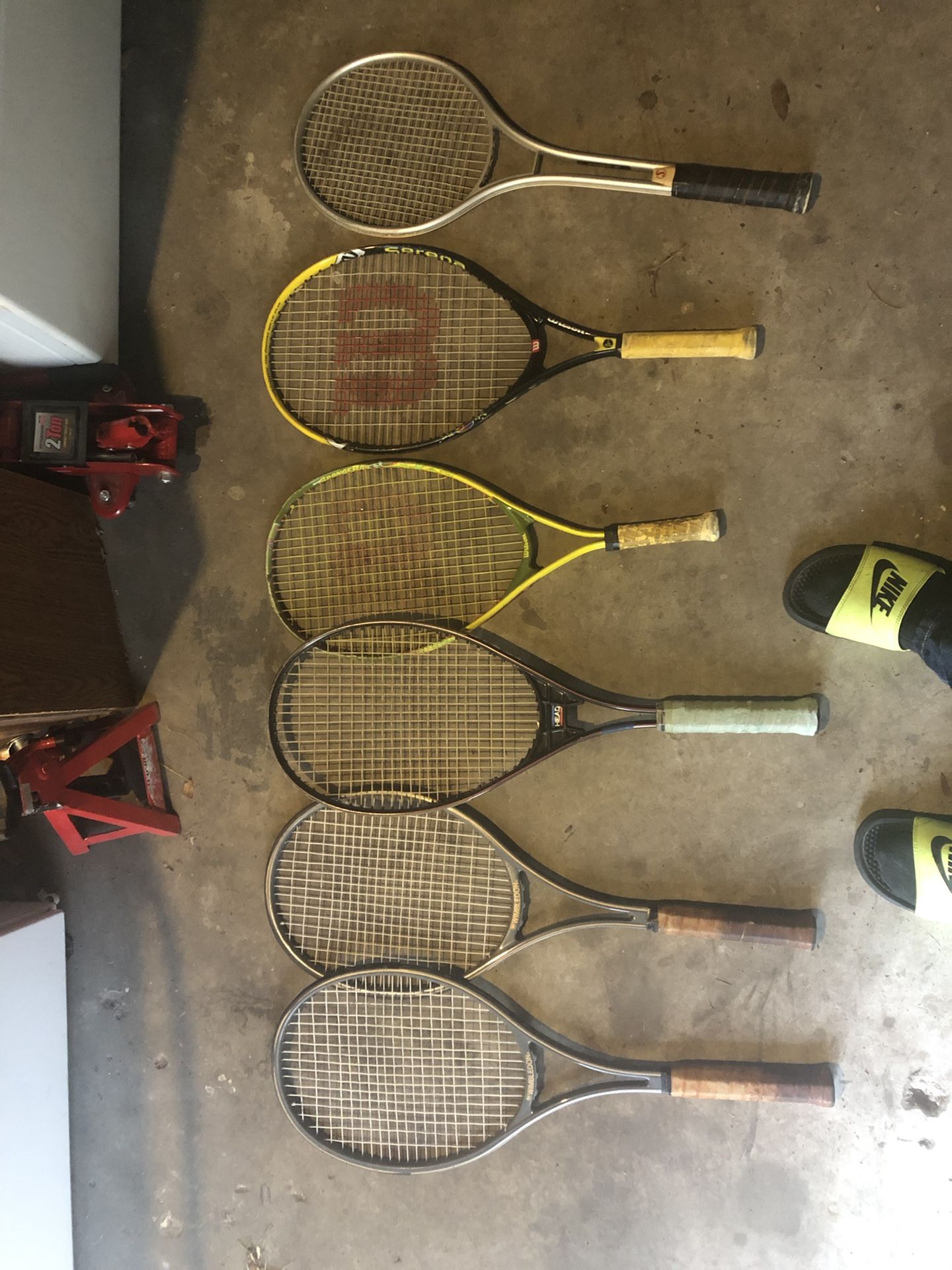 7 tennis rackets some pro different sizes