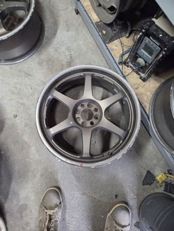 200. Bucks light weight Japanese racing wheels,  not good shape but 4x100