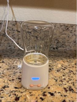 Milk warmer