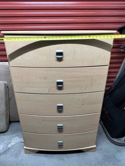 5-drawer chest and a dresser