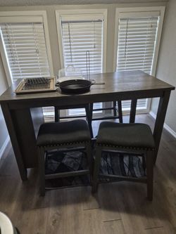 Table and 4 chair with side storage