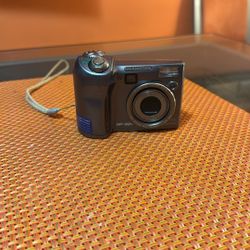 Olympus SP-320 7.1mp Digital Camera with 3X Optical Zoom  
