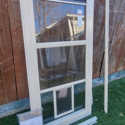 larson 32 inch storm door with dog