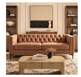 Like new faux leather sofa
