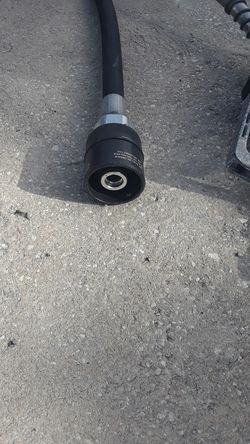 Hose and gas dispenser